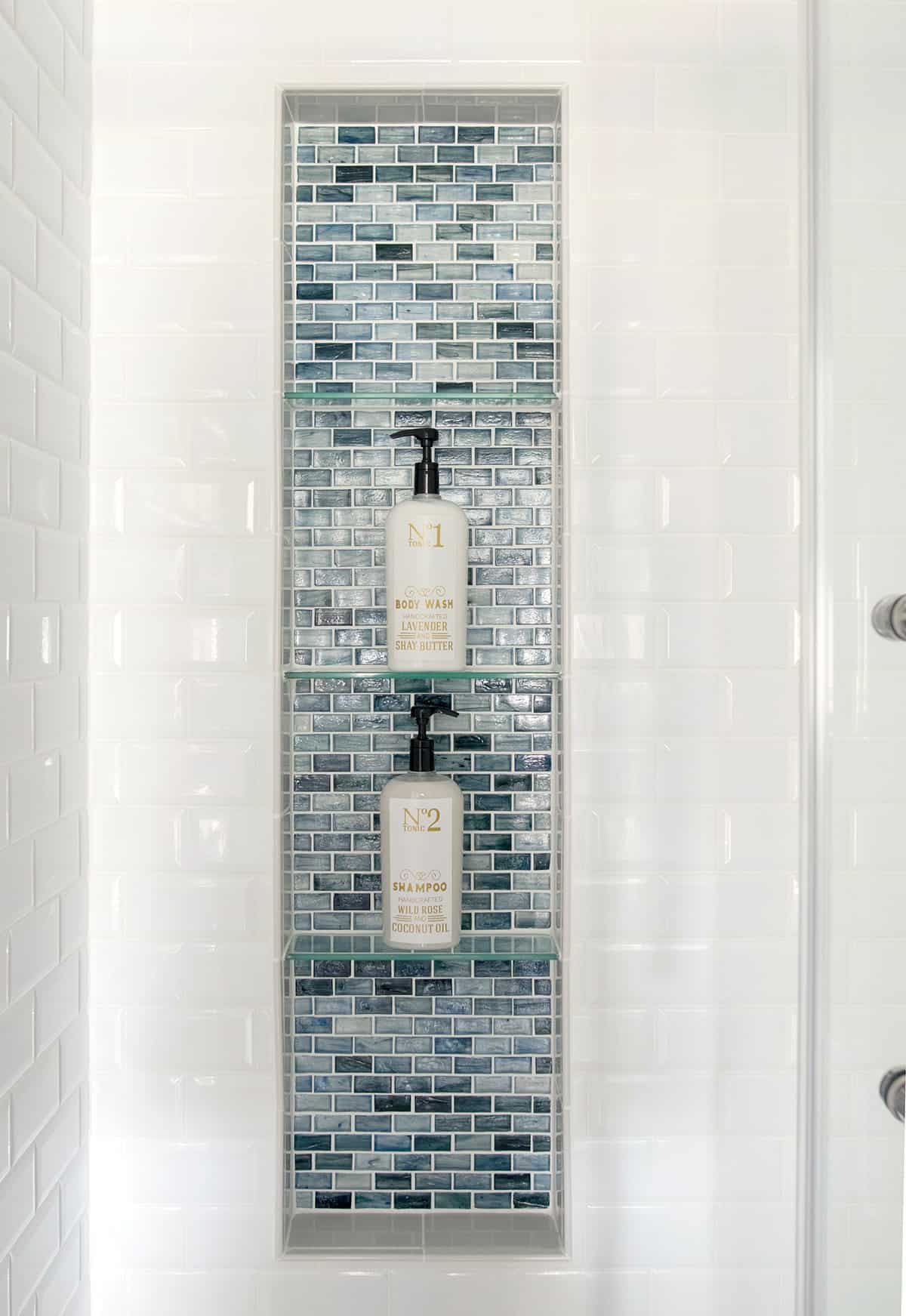 Bathroom shower with blue accent tiles