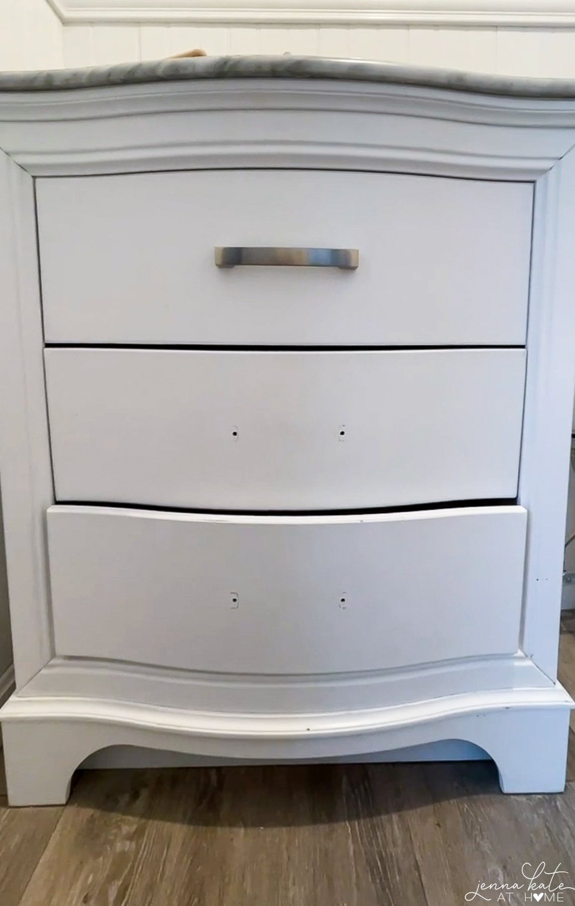 A close up shot of a cabinet without knobs