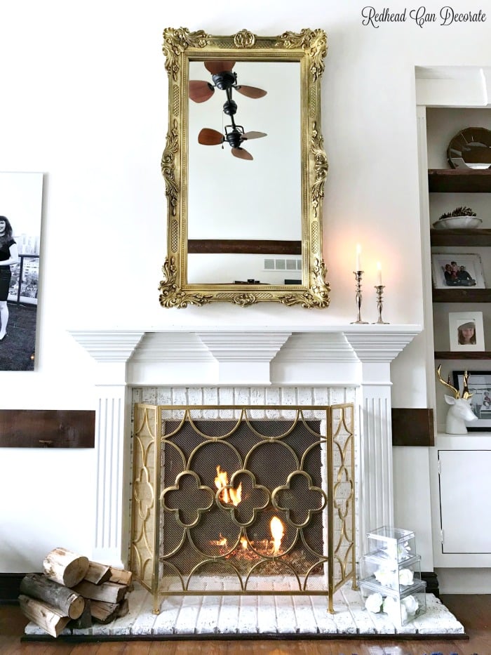 Thrifted Mirror hanging over Mantel in a Living. Room