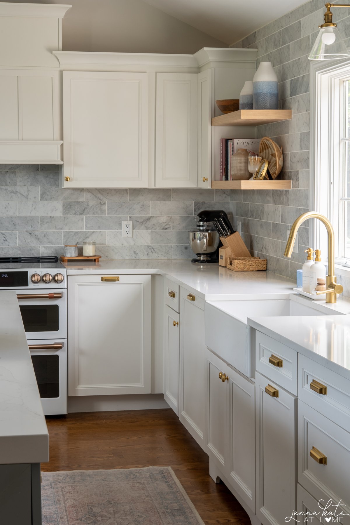 white kitchen cabinets with white quartz countertops