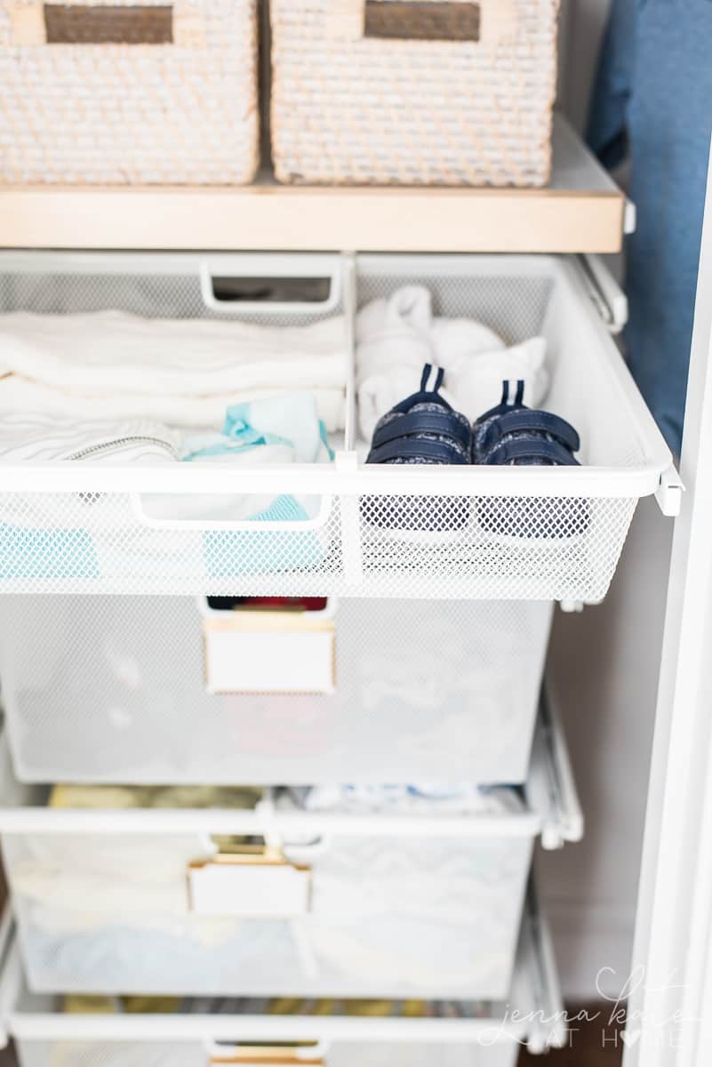 Drawer organizers sorting kid's clothing and shoes