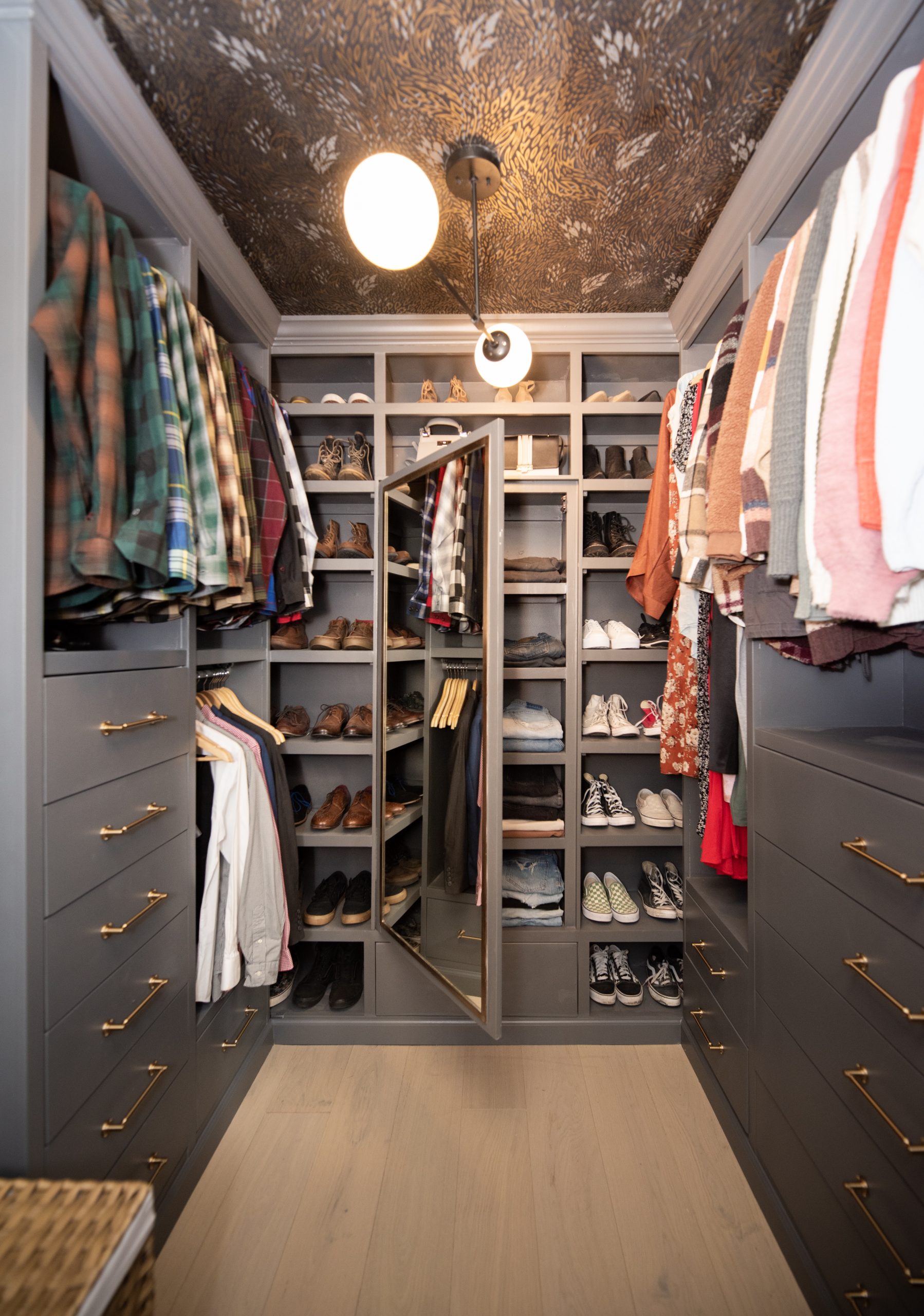 Closet with mirror built into closet shelf covers