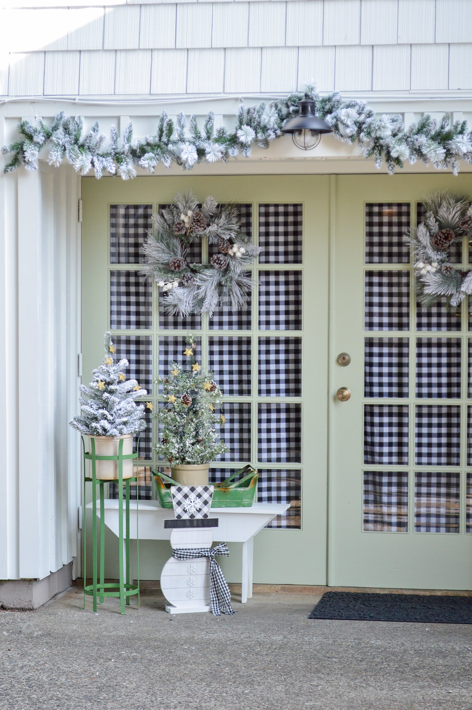 back deck doors painted with benjamin moore softened green paint