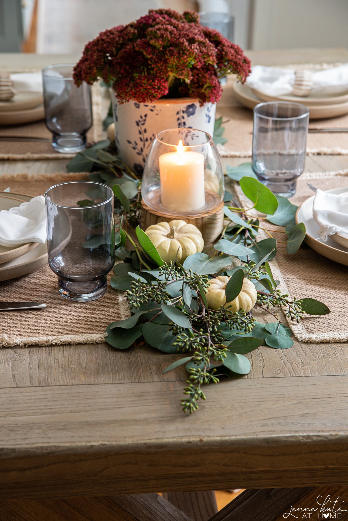 eucalyptus table runner with mini white pumpkins