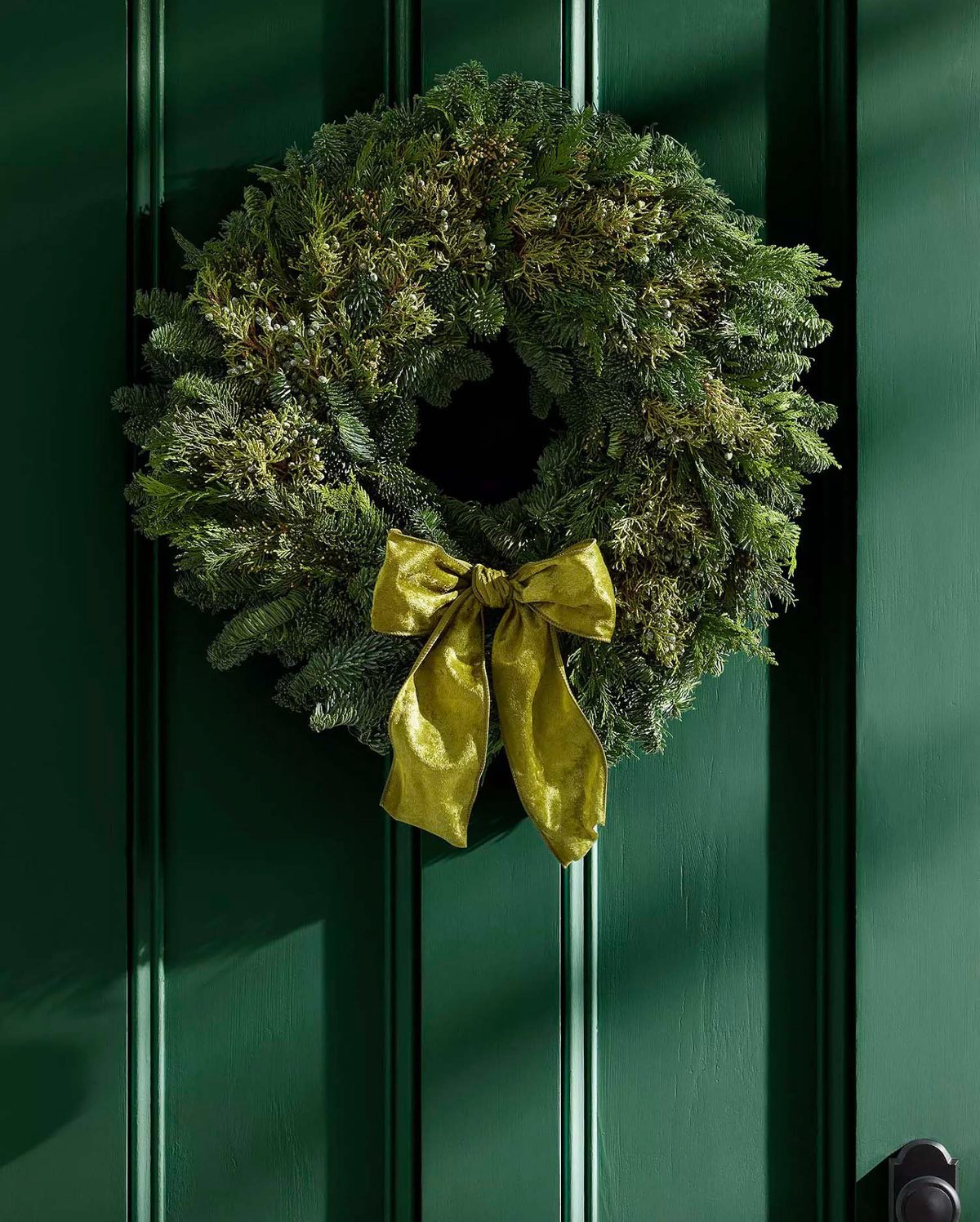 evergreen wreath with green bow