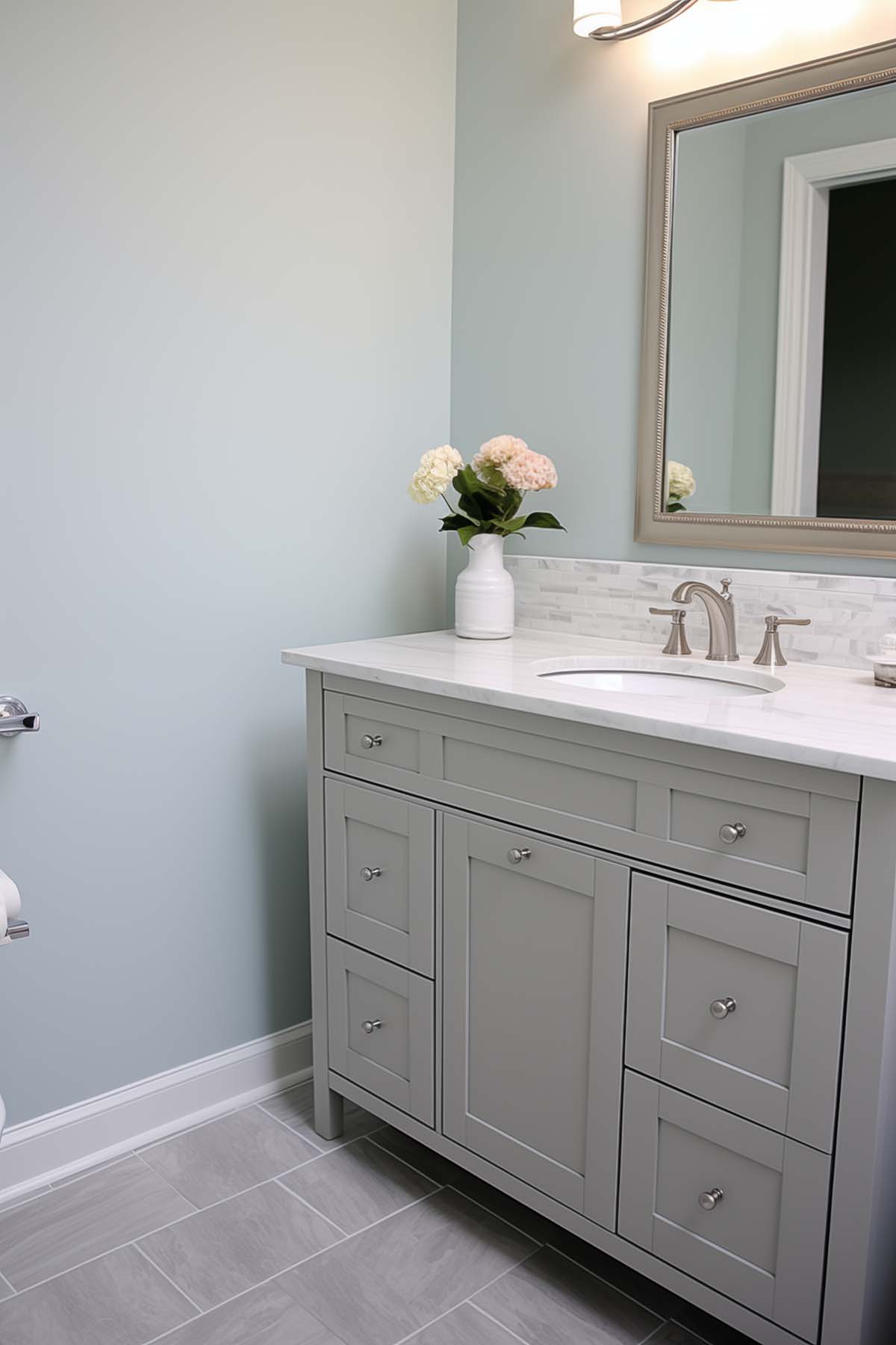 A bathroom with walls painted in sherwin williams sea salt