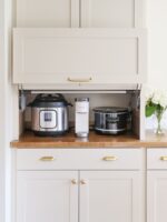 8 Kitchen Appliance Storage Ideas That Free Up Counter Space Jenna   Appliance Garage 150x200 