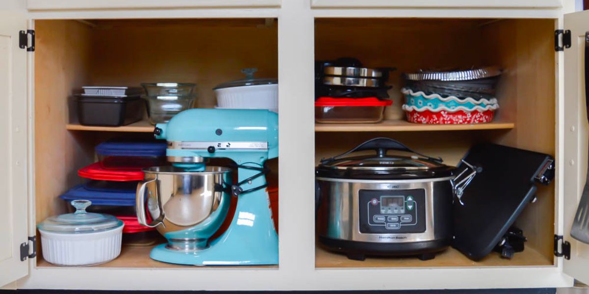 Kitchenaid Mixer and Crockpot in lower deep cabinets.