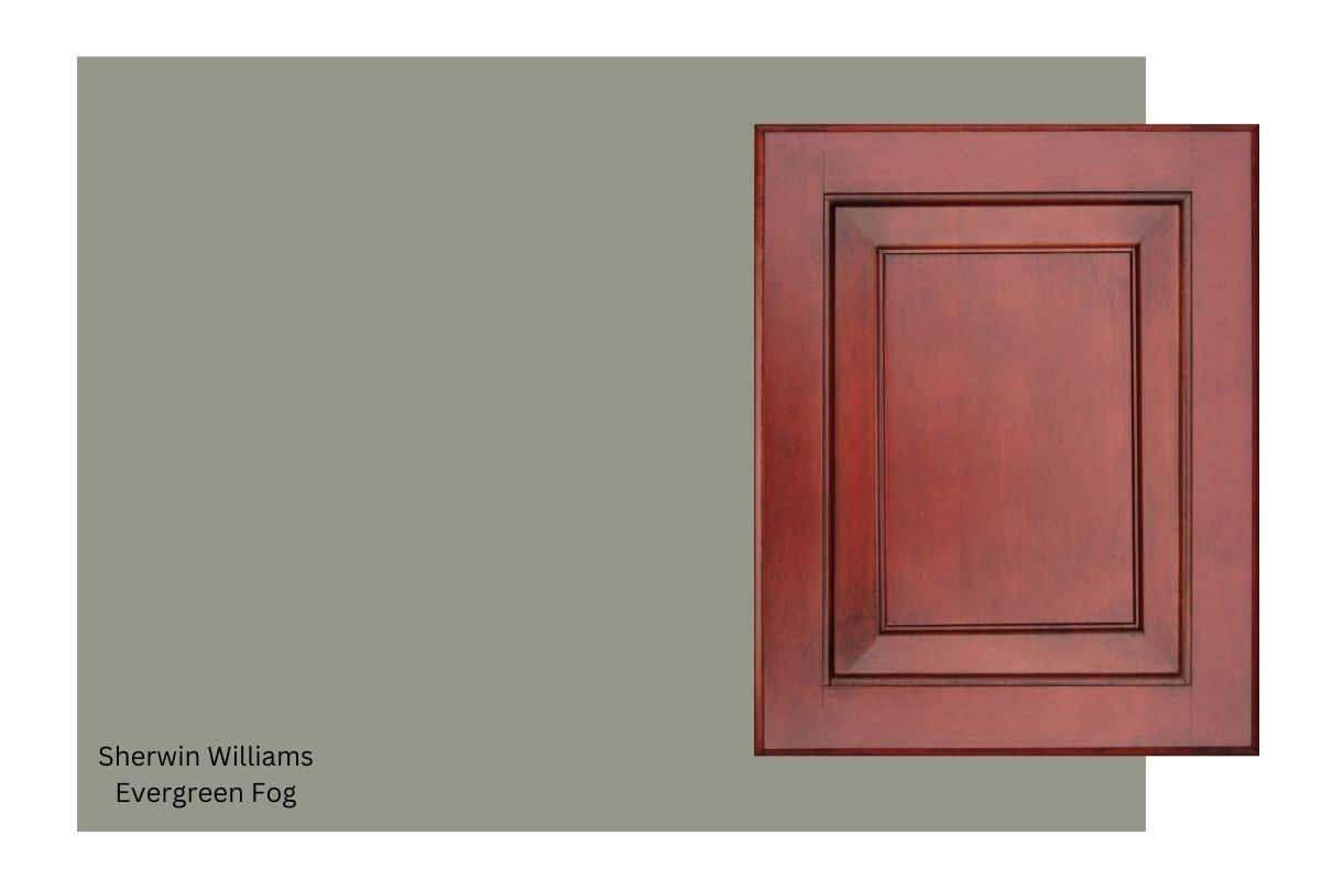 cherry wood cabinet with a swatch of Sherwin Williams Evergreen Fog.