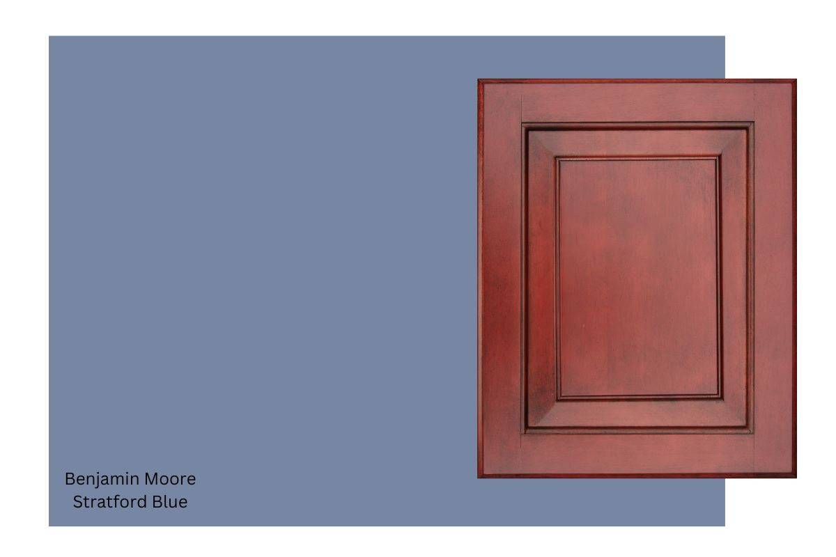 cherry wood cabinet with a swatch of Benjamin Moore Stratford Blue.