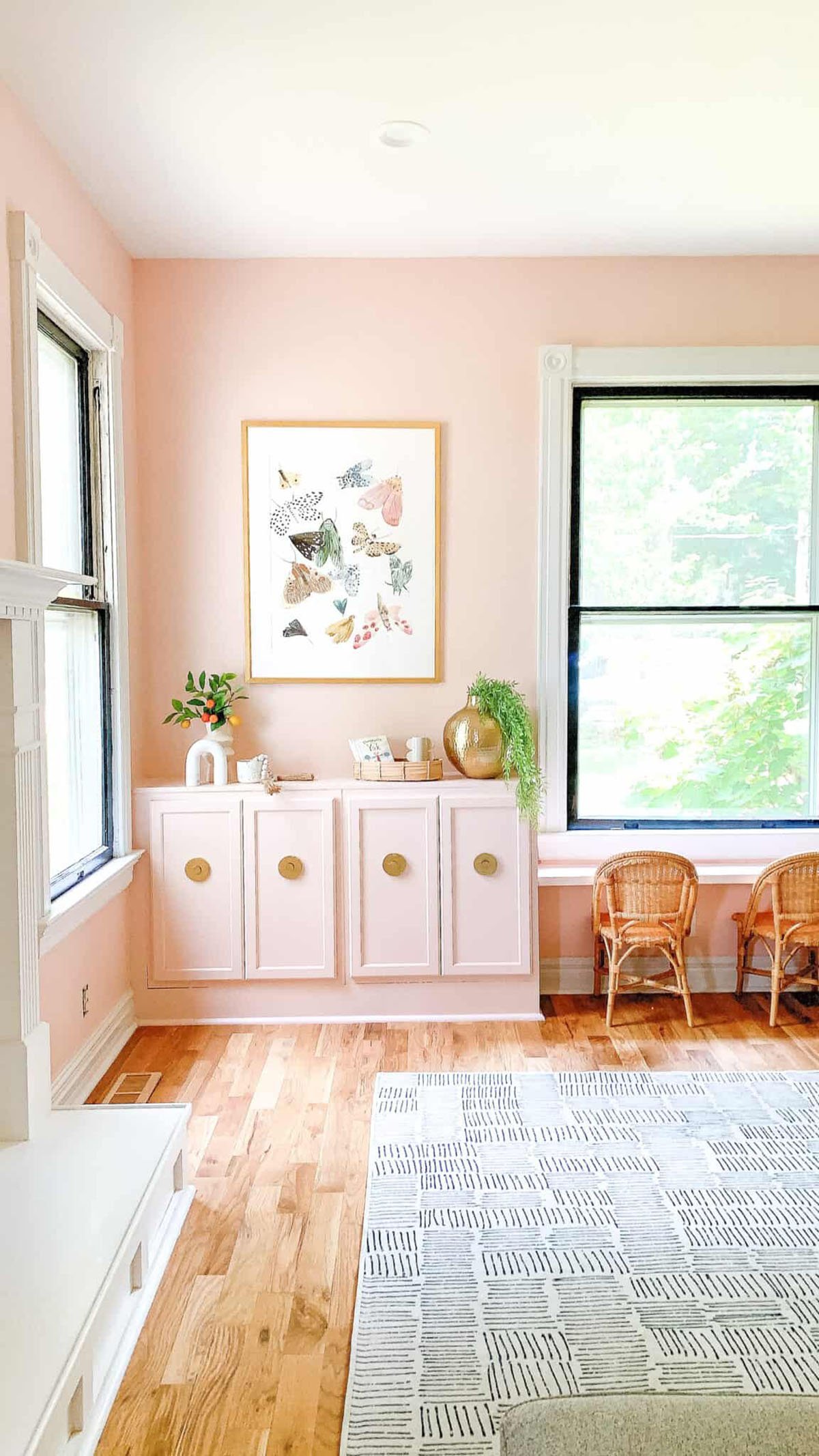office with walls and cabintets painted blush pink.