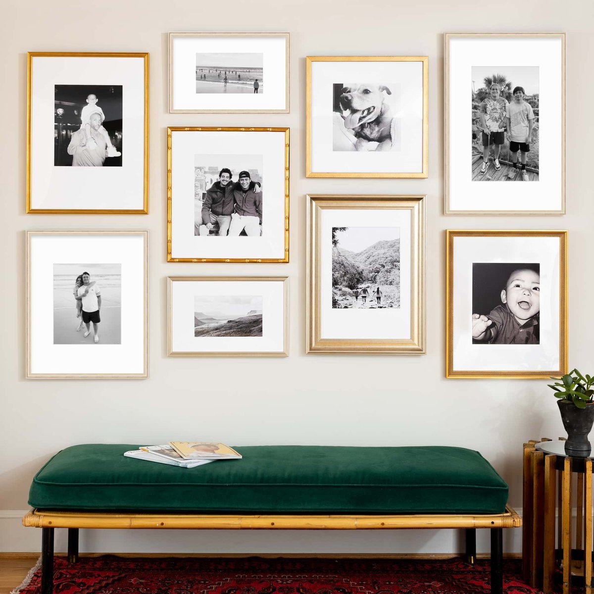 gallery wall with frames of different sizes and colors.