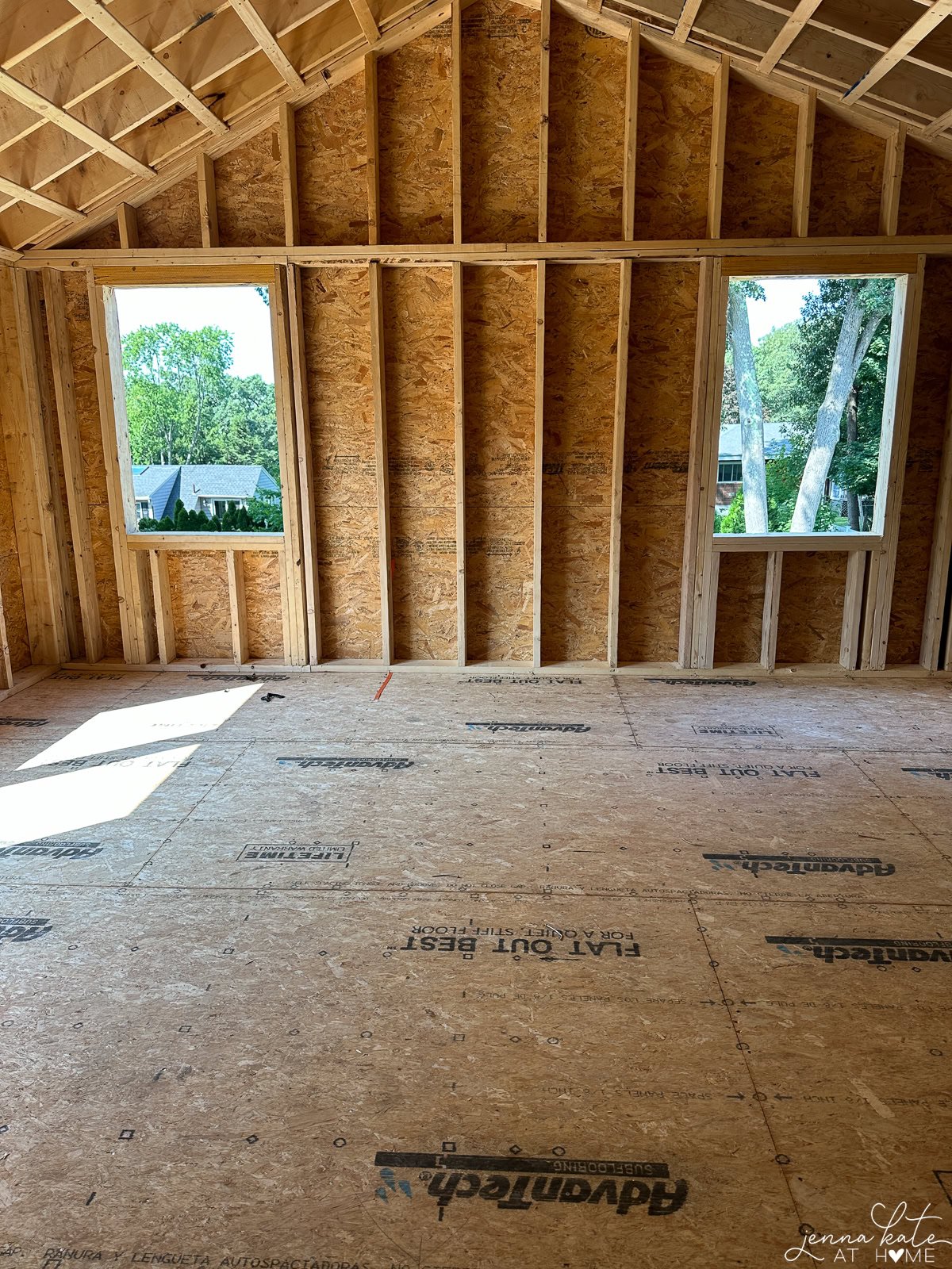 framed bedroom stud walls and plywood floor.