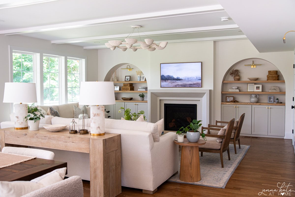Large family room with Frame TV mounted over the fireplace.